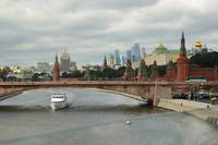 Moscow - view from Zaryadie viewpoint over the Kremlin walls, and in the back one of the Stalin's Sisters and Moskva-city